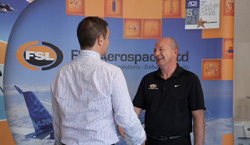 Richard Woodward greets a customer